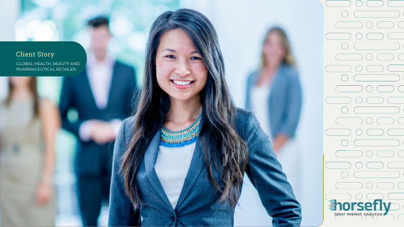 Image shows a business woman smiling at the camera