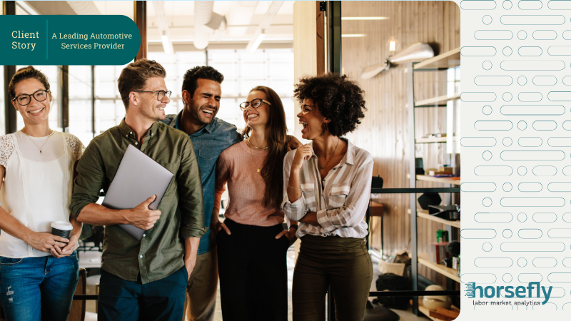 Image shows a group of workers happily talking in a corridor for the blog Salary Transformation Journey: How Horsefly Empowered a Leading Automotive Services Provider's Compensation Strategy